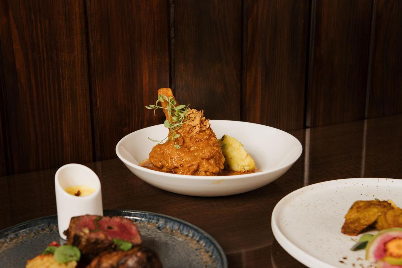 The Lalit London Hotel Bagian luar foto A plate of chicken 65