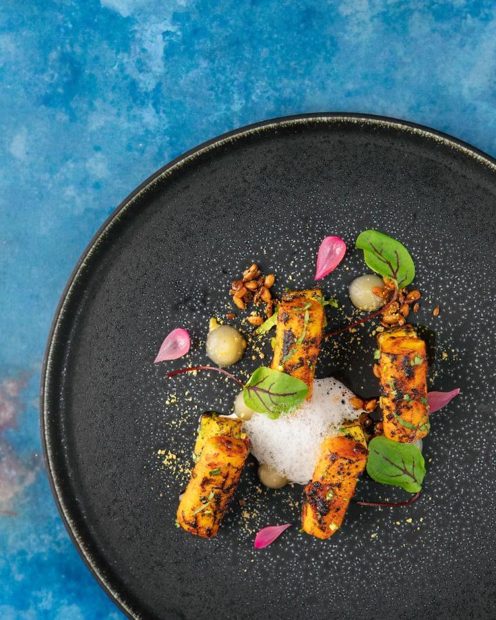 The Lalit London Hotel Bagian luar foto A dish from the restaurant